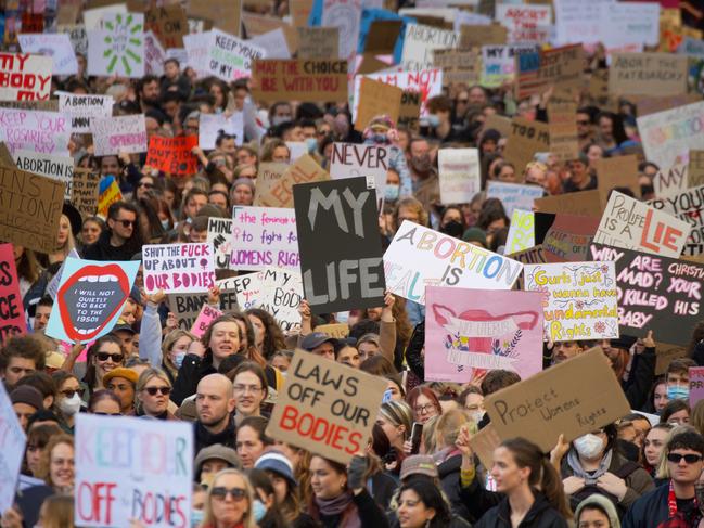 People marching through the streets of Melbourne last July. Picture: NCA NewsWire / Luis Enrique Ascu