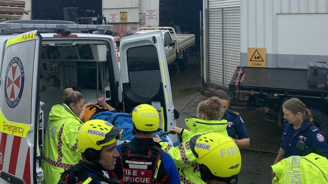 The dramatic rescue of a woman believed to be in her 80s, rescued form flood waters near Kempsey. Picture: Dan Mills