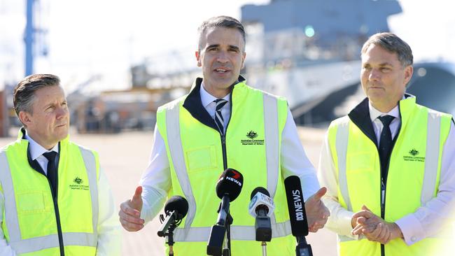 Deputy Prime Minister, Richard Marles MP, Premier of South Australia Peter Malinauskas, and Member for Hindmarsh, Mark Butler at the Osborne Naval Shipyard, Adelaide. Picture: David Mariuz