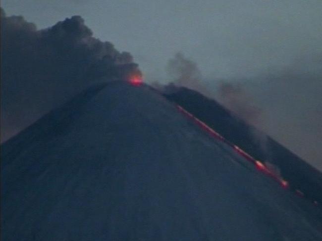 Lava flows from the Shiveluch volcano in the Kamchatka Peninsula eastern Russia is this image taken from TV Thursday 28 Oct 2010. Volcanic eruptions on Russia's far-eastern Kamchatka Peninsula have tossed massive ash clouds into the air, forcing flights to divert and blanketing a town with ashes. (AP Photo/RTR, via APTN) ** RUSSIA OUT TV OUT **