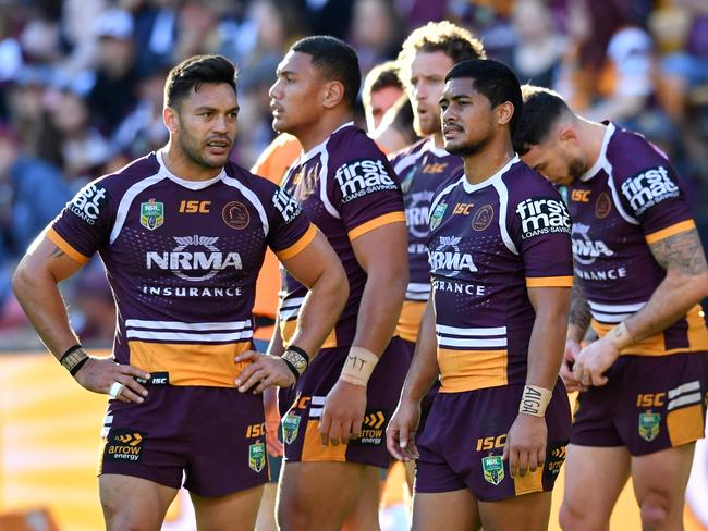 Broncos players are seen reacting after a Warriors try during the Round 18 NRL match between the Brisbane Broncos and the Warriors at Suncorp Stadium in Brisbane, Sunday, July 15, 2018. (AAP Image/Darren England) NO ARCHIVING, EDITORIAL USE ONLY