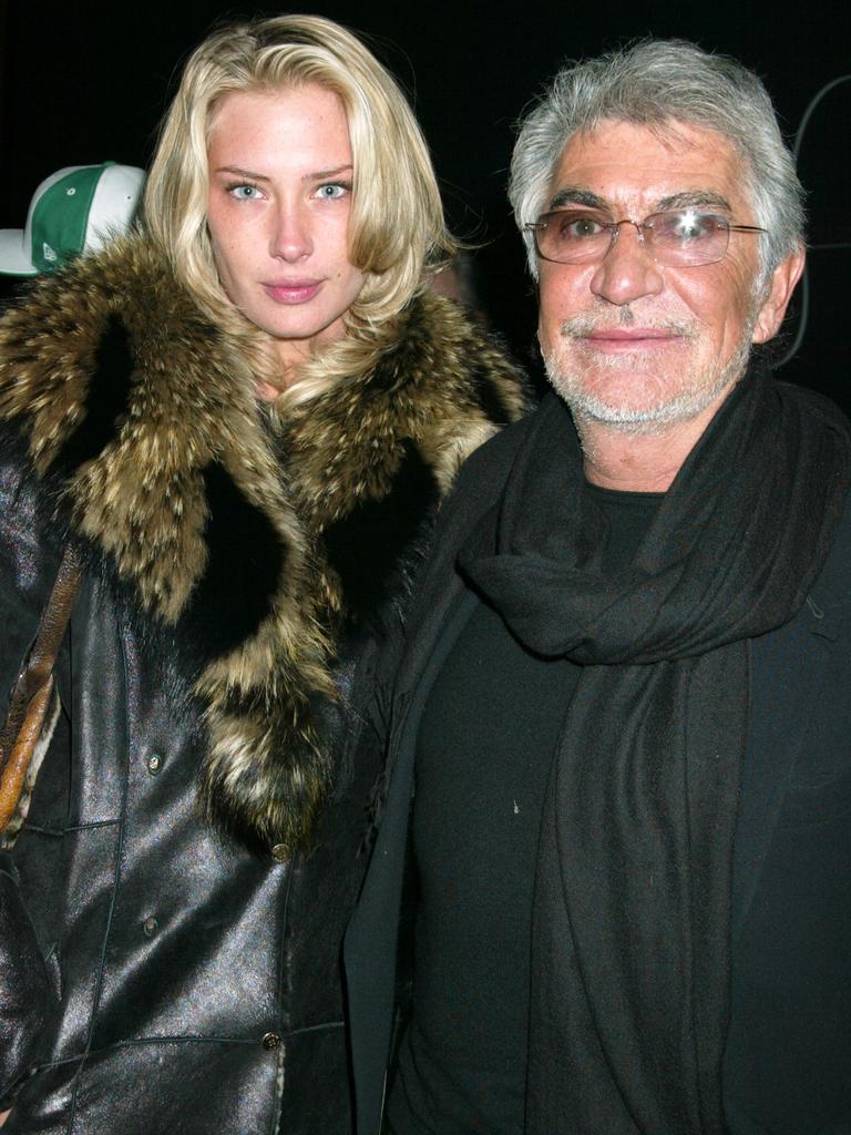 Crystal McKinney pictured with fashion designer Roberto Cavalli in 2003. Picture: Gregory Pace/FilmMagic