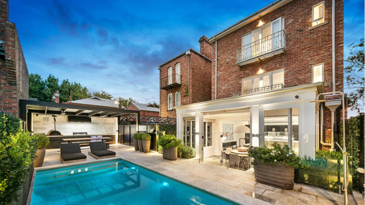 The pool and back yard of the St Kilda West home.