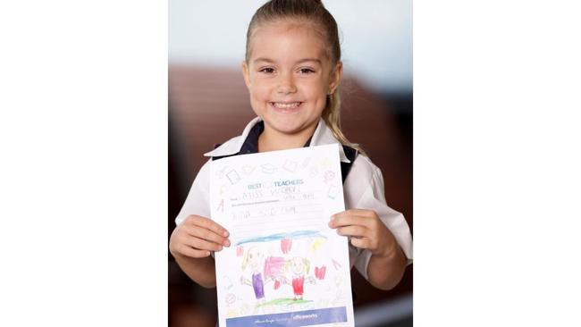 Isla Kurzydlo with her letter for Mrs Walker. Picture: Steve Pohlner