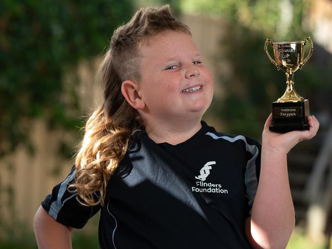 22nd of January 2025  - Mullet Cup Winner Ambrose Skyrypek, 8, at home in Aldinga Beach with parents Kim and Michael. Photo: Naomi Jellicoe