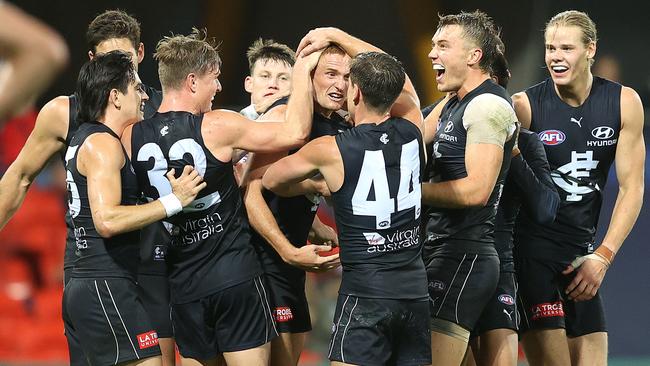 Matthew Cottrell of the Blues is congratulated by teammates after kicking the winning over Sydney Picture: Getty Images