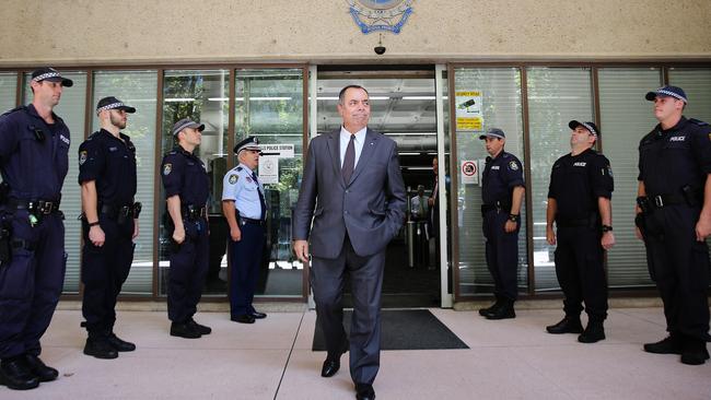 NSW Police Deputy Commissioner Nick Kaldas leaves through a guard of honour at Surry Hills Police Centre yesterday. Picture: Craig Greenhill