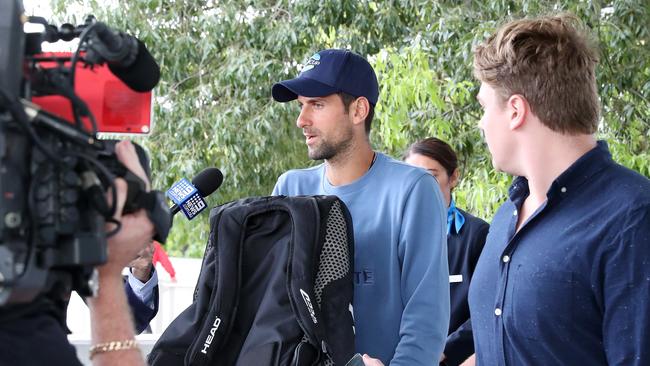 Tennis star Novak Djokovic arrives at Brisbane International Airport for the ATP Cup. Photographer: Liam Kidston.