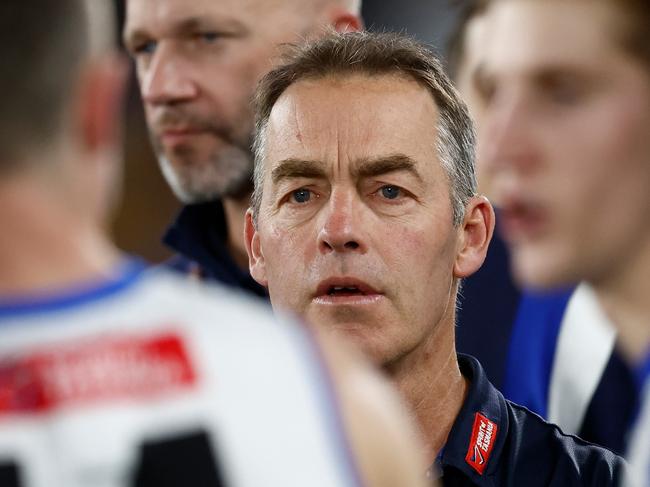 MELBOURNE, AUSTRALIA - AUG 18: Alastair Clarkson, Senior Coach of the Kangaroos addresses his players during the 2024 AFL Round 23 match between the Western Bulldogs and the North Melbourne Kangaroos at Marvel Stadium on August 18, 2024 in Melbourne, Australia. (Photo by Michael Willson/AFL Photos via Getty Images)