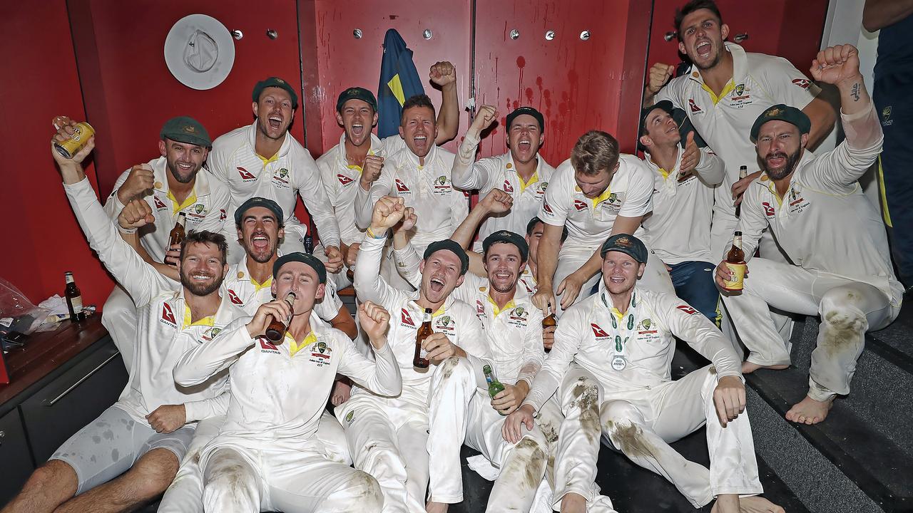 MANCHESTER, ENGLAND - SEPTEMBER 08: The Australian Cricket Team celebrate in the change rooms after Australia claimed victory to retain the Ashes during day five of the 4th Specsavers Test between England and Australia at Old Trafford on September 08, 2019 in Manchester, England. (Photo by Ryan Pierse/Getty Images)