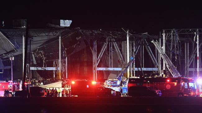 First responders surround a damaged Amazon Distribution Centre in Edwardsville, Illinois. Picture: Getty