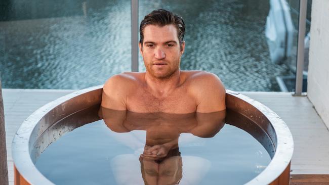Anthony Savage doing a cold plunge in an Odin ice bath at home on the Gold Coast, Queensland.