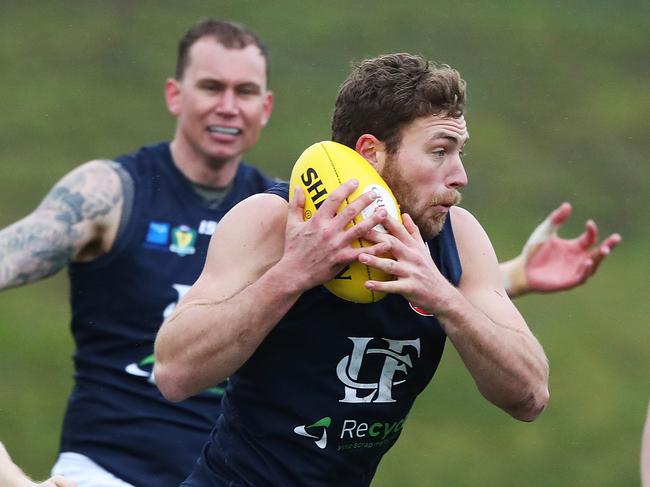 Mitch Thorp, left, almost gave Jobi Harper the weekend off because of illness, but Harper put in an absolute masterclass to demolish Glenorchy on Saturday. Picture: NIKKI DAVIS-JONES