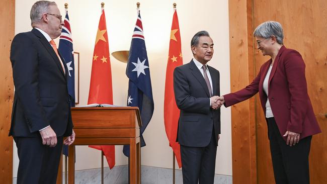 Prime Minister Anthony Albanese and Foreign Minister Penny Wong welcome Chinese Foreign Minister Wang Yi to Parliament House. Picture: NCA NewsWire / Martin Ollman