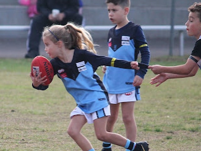 ‘Don’t argue’ with Mackenzie Cotchin when she’s got the ball. Picture: Instagram