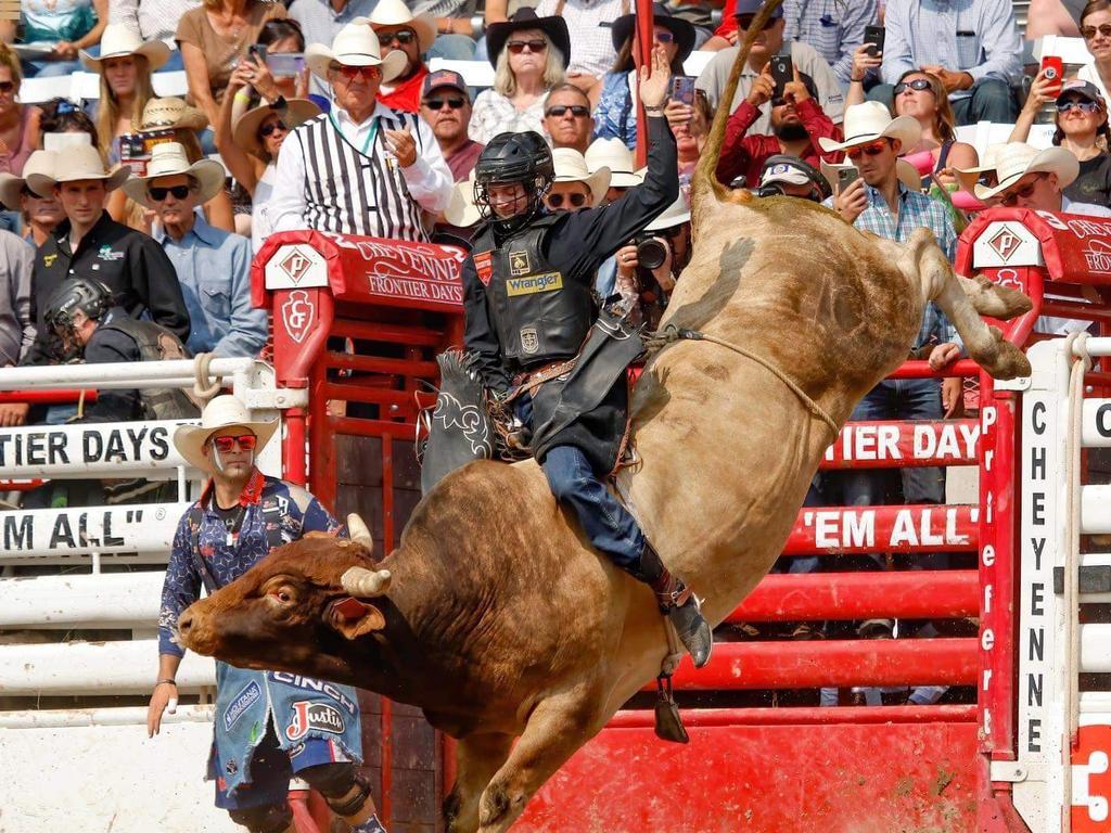 Ky Hamilton rides out at the 2021 Bull Riding Champion of Cheyenne Frontier Days Rodeo. Picture: Robert Rosales Natural Light Photography/Supplied.