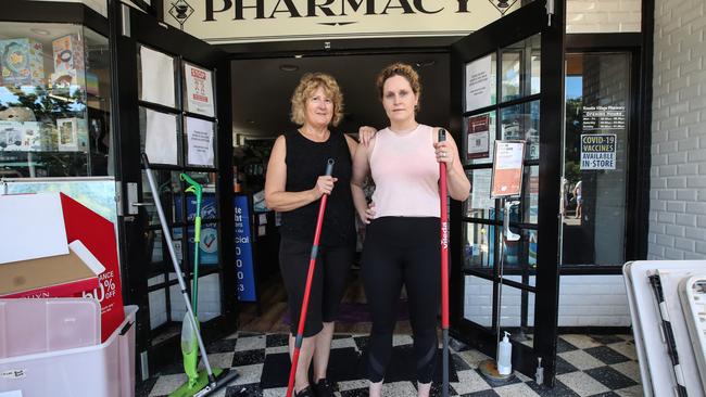 Front shop assistant at Rosalie Village Pharmacy, Jill Kington alongside co-owner Naomi Bartlett as they begin the clean up and get ready to re-open to the public. Picture: Zak Simmonds