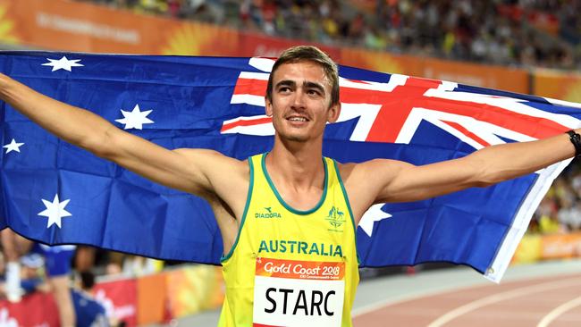 Brandon Starc of Australia celebrates a gold medal win during the mens highjump final on day seven of competition at Carrara Stadium on the Gold Coast, Australia, Wednesday, April 11, 2018. (AAP Image/Dean Lewins) NO ARCHIVING, EDITORIAL USE ONLY