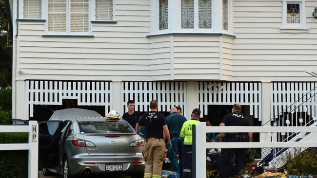 A woman was taken by ambulance to hospital after crashing into a house at Grange. Picture: David Clarke