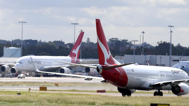 A Qantas Boeing 737-800 taxis to the terminal at Sydney Airport. Picture: AAP