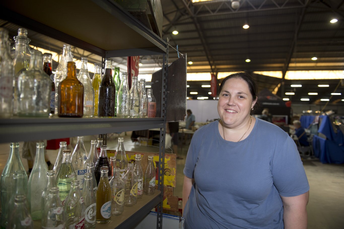 Belinda Watt checks out a large bottle collection. Swap Meet at Showgrounds. February 2019. Picture: Bev Lacey