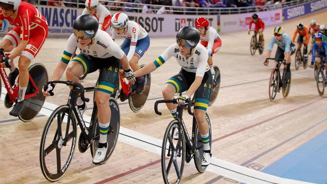 Australia's Amy Cure and Australia's Annette Edmondson hand over during the women's 30km Madison final at the UCI track cycling World Championship at the velodrome in Berlin on February 29, 2020. (Photo by Odd ANDERSEN / AFP)