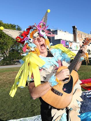 Performer Tim Jackman lets rip with a monster theme at the Brisbane Powerhouse on a giant rug as a promo for Powerkids. (no other kids at shoot)