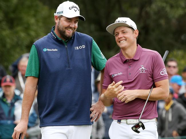 I (L-R) Australians Marc Leishman and Cameron Smith are at the front of the queue to take on Tiger Woods. Picture: Michael Klein