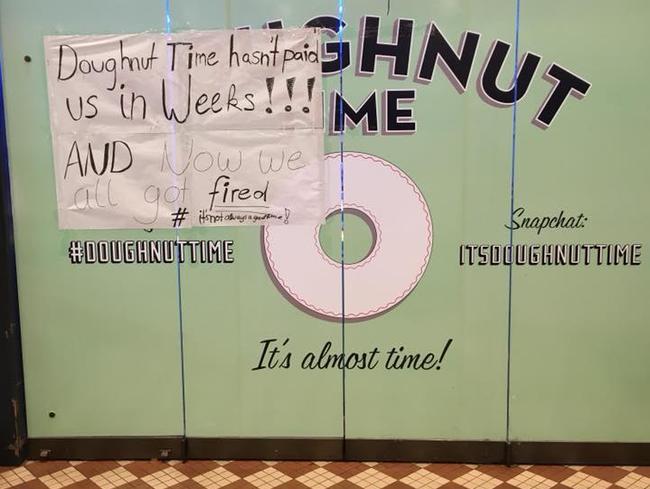 #itsnotalwaysagoodtime: A sign outside the Queen Victoria Building store in Sydney says employees haven't been paid in weeks. Picture: Emily Kula