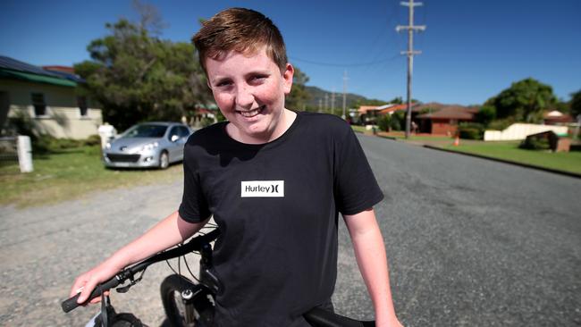 Archie Cross, 13, jumped into his tinnie and went to rescue his neighbours during the flood disaster. Picture: Nathan Edwards