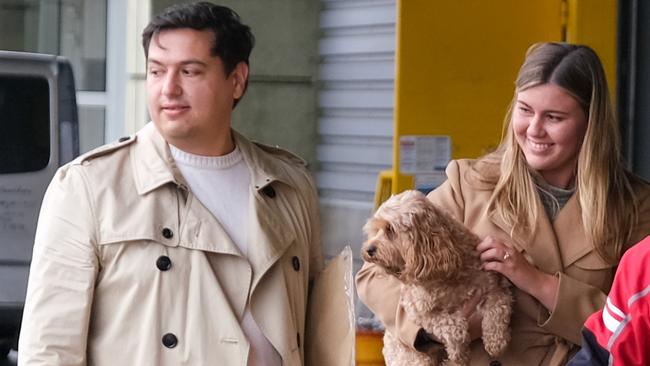 David Sharaz and Brittany Higgins collecting their cavapoodle Kingston after arriving in France in late 2023. Picture: Jacquelin Magnay