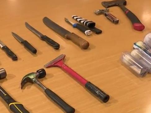 Children are among those who've been caught with weapons, including a tomahawk, axe, a machete and hammers, on the first weekend of new knife laws.