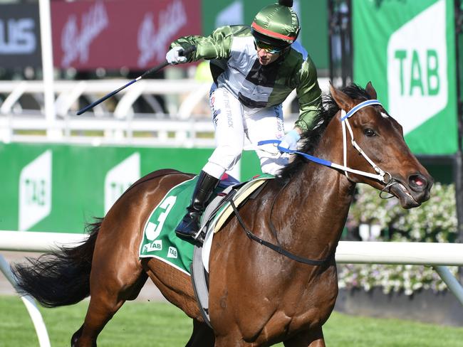 MELBOURNE, AUSTRALIA - OCTOBER 02: Brett Prebble riding Incentivise winning Race 7, the Tab Turnbull Stakes, during Melbourne Racing at Flemington Racecourse on October 02, 2021 in Melbourne, Australia. (Photo by Vince Caligiuri/Getty Images)