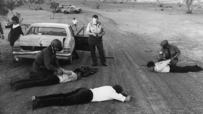 Former "The News" and The Advertiser staff photographer Ray Titus won a Walkley Award for this photograph showing the culmination of a 26-hour manhunt. Picture: Ray Titus