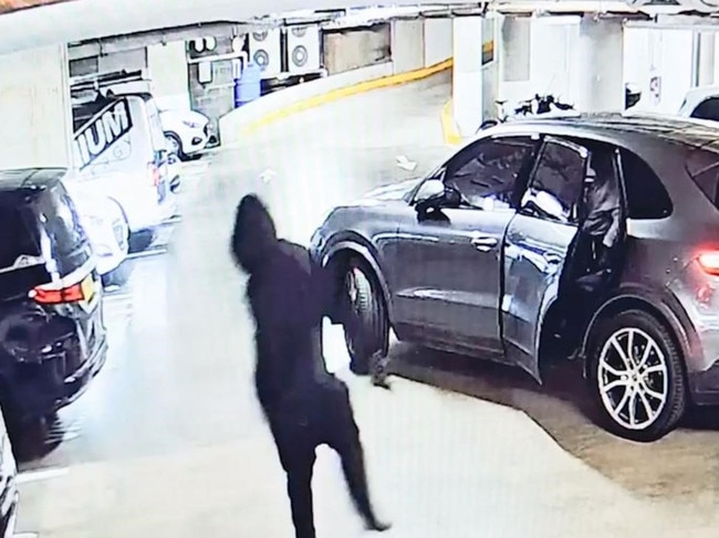 CCTV released by police shows a man with a gun jumping into a car after the fatal shooting of Alen Moradian.