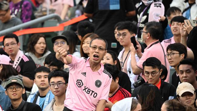 Fans react after not seeing Inter Miami's Argentine forward Lionel Messi play after the friendly football match between Hong Kong XI and US Inter Miami CF. (Photo by Peter PARKS / AFP)