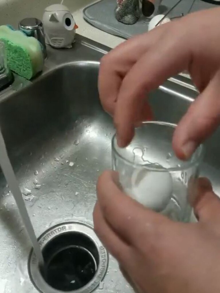 A hack to effortlessly remove the shell of a hard-boiled egg has gone viral – but not because people are impressed. Picture: Twitter