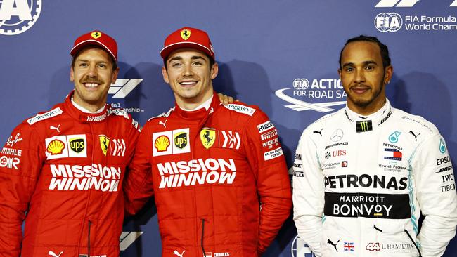 Top three qualifiers (L-R) Sebastian Vettel of Germany and Ferrari (second) Charles Leclerc of Monaco and Ferrari (first) and Lewis Hamilton of Great Britain and Mercedes GP (third) celebrate in parc ferme during qualifying for the F1 Grand Prix of Bahrain. Picture: Will Taylor-Medhurst/Getty Images