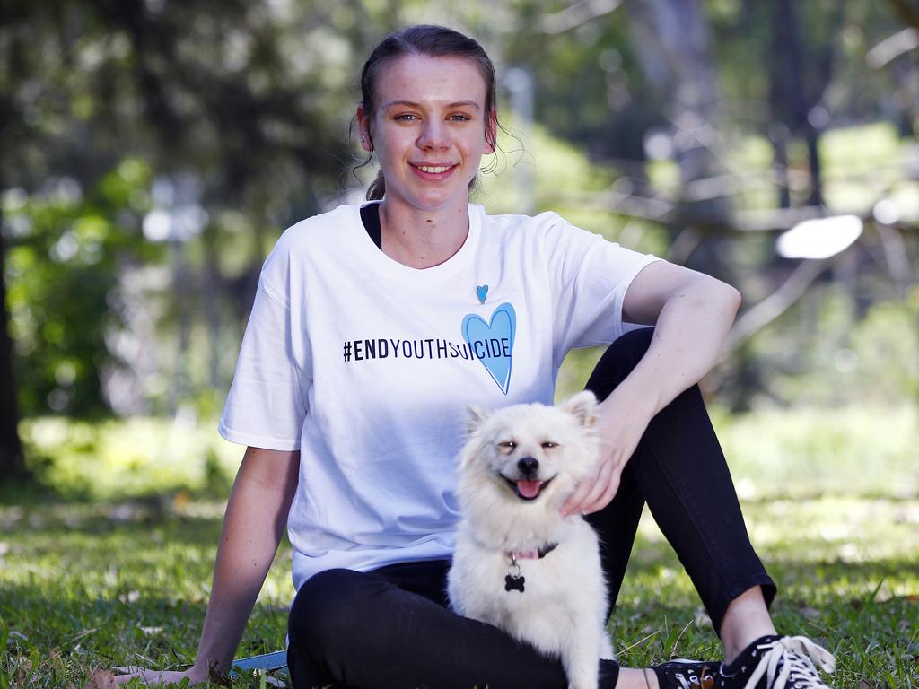 Nelani Botha, 20, (with dog Coco) was severely bullied as a teen after coming to Australia from South Africa. Picture: Sam Ruttyn