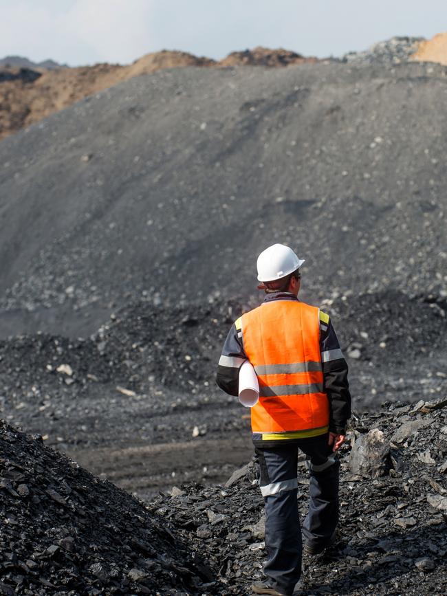 Muswellbrook Coal Mine has a stockpile of coal that will still exist on its December deadline for closure. Istock.