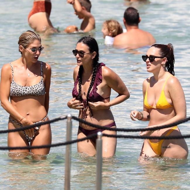 Mother and daughter take a dip in the Greek water to cool off. Picture: Backgrid