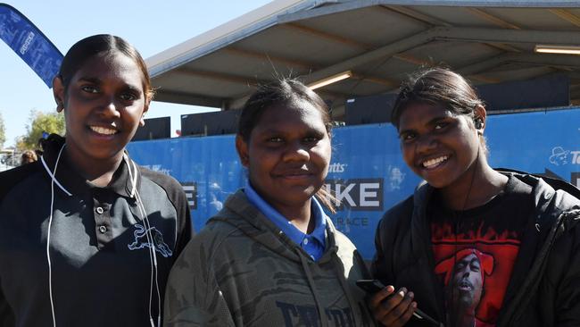 Roseanne, Shakoda and Petalee from Borroloola at Finke Desert Race 2022. Picture: (A)manda Parkinson