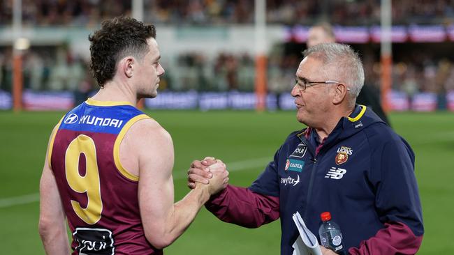 Lachie Neale and Chris Fagan. Picture: Russell Freeman/AFL Photos via Getty Images