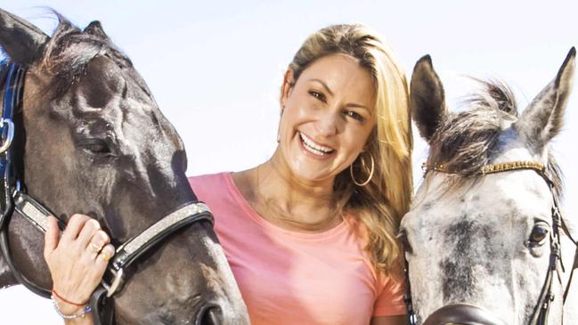 HOLD COURIER MAIL FRIDAY Summer racing preview pic.Injured jockey Tegan Harrison and Liz Cantor (pink top) with a horse, Tegan had a fall and Liz has been exercising the horses while Tegan recovers.Picture: NIGEL HALLETT