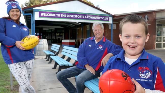 Cove Football Club has gone through so much in past six months with a council inquiry into alleged inappropriate behaviour. Now, like everyone else, the club is looking forward to getting back to playing and catching up with each other. Club President, Tony Kernahan, with the women's team Captain, Dana O'Brien, and her 5 year old son, Braylen. Picture: Dean Martin.