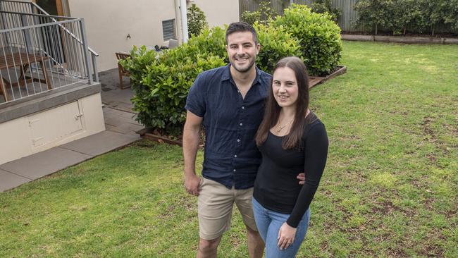 New homeowners Nik Stuart and Jasmine Beech love their first house in Toowoomba. Friday, October 1, 2021. Picture: Nev Madsen.