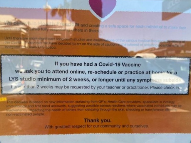 Anti-vax sign on business window in Mullumbimby, NSW.