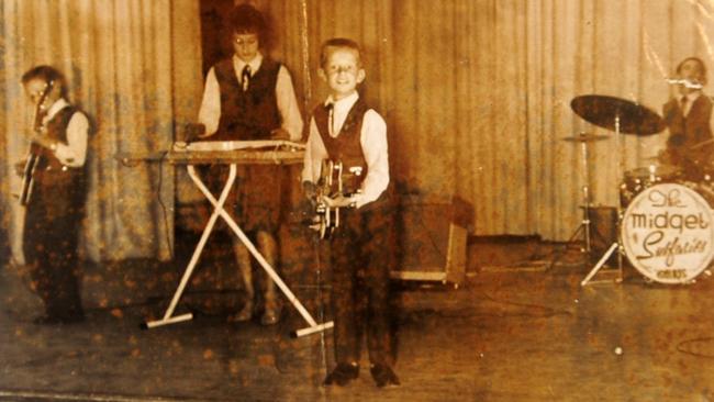 A 1964 picture of the family band, the Midget Surfaris, performing in Geraldton with Phil, Virginia, Tommy and Chris Emmanuel. Picture: supplied