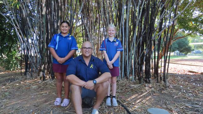 Jingili Primary School principal Mark Mangohig and students Robin Box and Arla Griggs. Picture: Darcy Fitzgerald