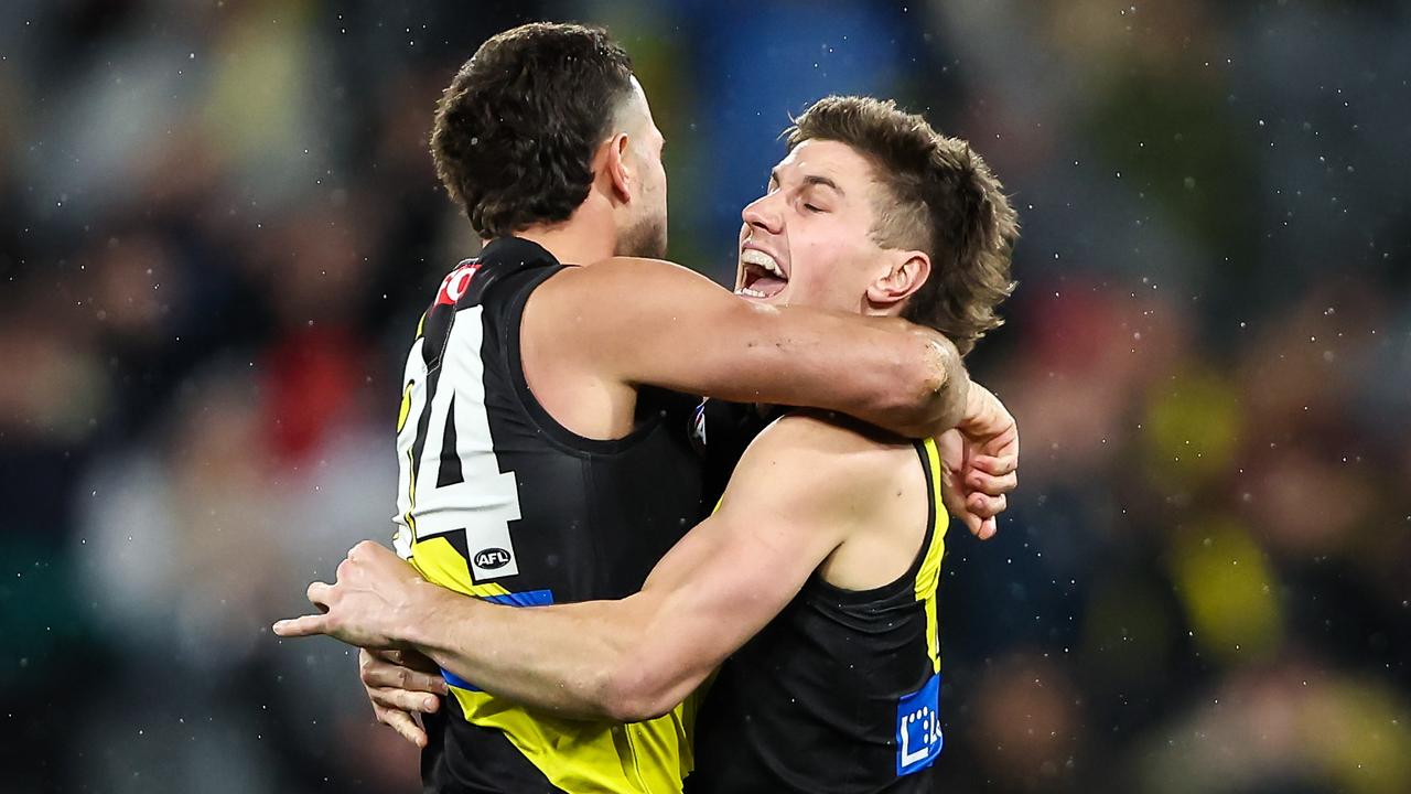 MELBOURNE, AUSTRALIA - JULY 06: Jack Graham of the Tigers celebrates a goal with teammate Liam Baker during the 2023 AFL Round 17 match between the Richmond Tigers and the Sydney Swans at the Melbourne Cricket Ground on July 6, 2023 in Melbourne, Australia. (Photo by Dylan Burns/AFL Photos via Getty Images)